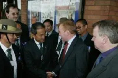 Gurkhas being greeted by Charles Kennedy at Lib Dem Conference in Bournemouth
