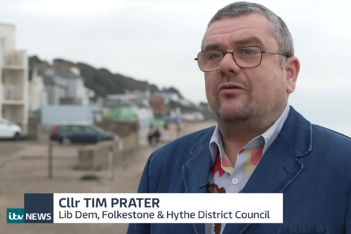 Tim Prater captioned in TV interview