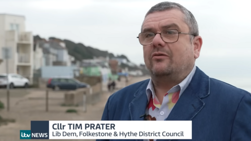 Tim Prater captioned in TV interview