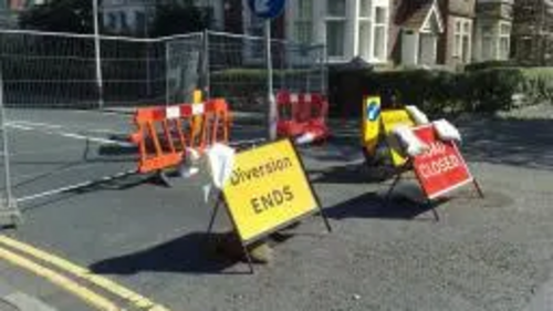 Road closed signs and barriers