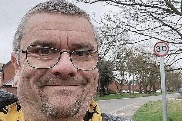 Tim Prater with 30 mph repeater sign