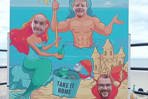 Jim Martin, Polly Blakemore and tim Prater with seaside board