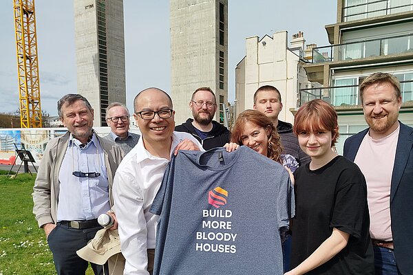 Larry Ngan and Lib Dem campaigners with "Build More Houses" t-shirt on The Leas, Folkestone