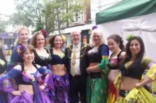 Tom McNeice with belly dancers